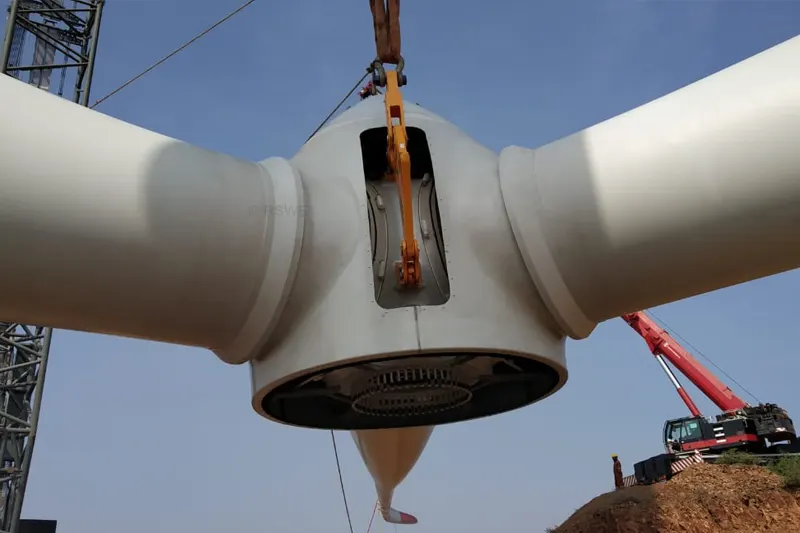 Close-up of turbine nacelle and hub during installation